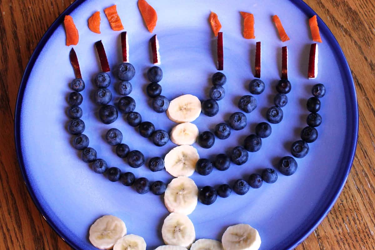 Fruit Menorah on blue plate 