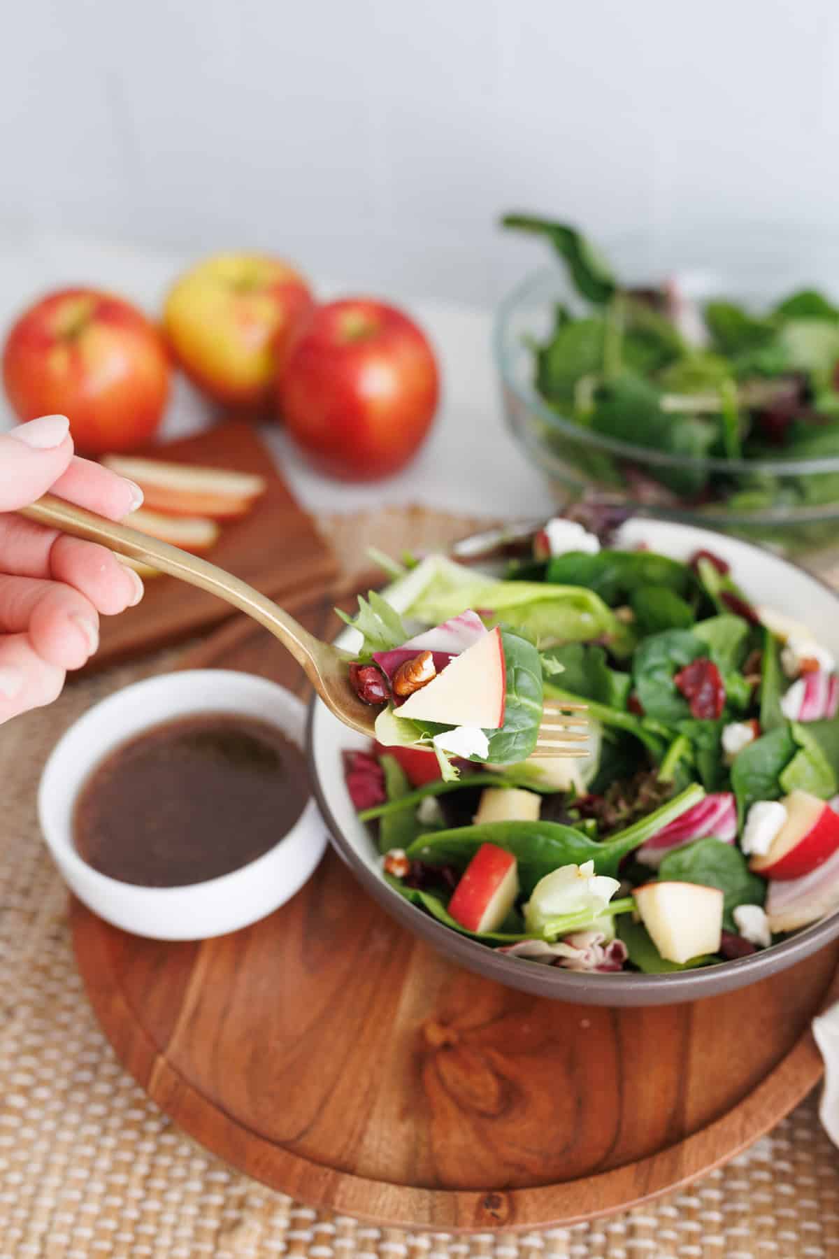 Apple and walnut salad with feta in bowl