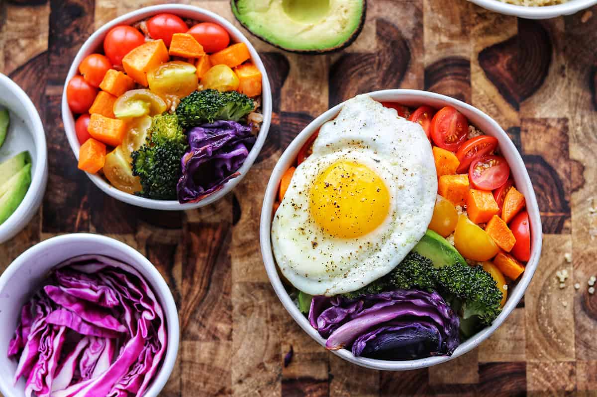 https://healthyfamilyproject.com/wp-content/uploads/2018/08/Rainbow-Buddha-Bowl-with-egg-landscape-web.jpg