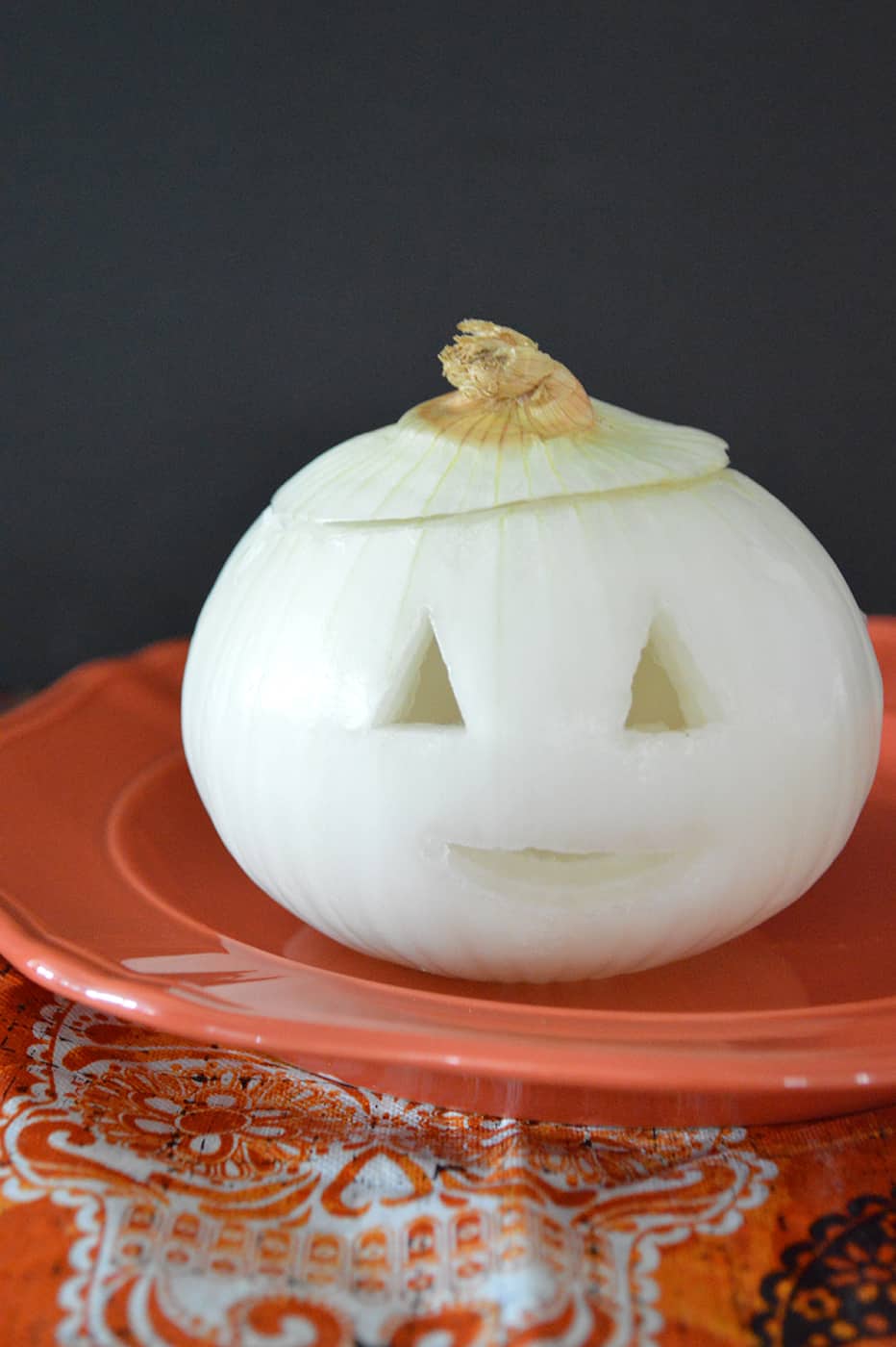 Carving an onion for Halloween