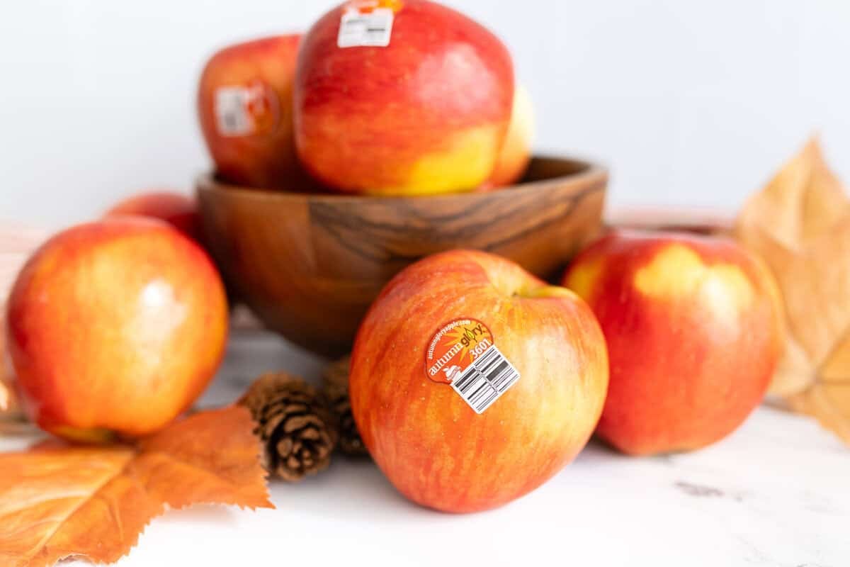 Fresh Autumn Glory apples in a wooden bowl, ready to be sliced for an upside down apple skillet pancake recipe