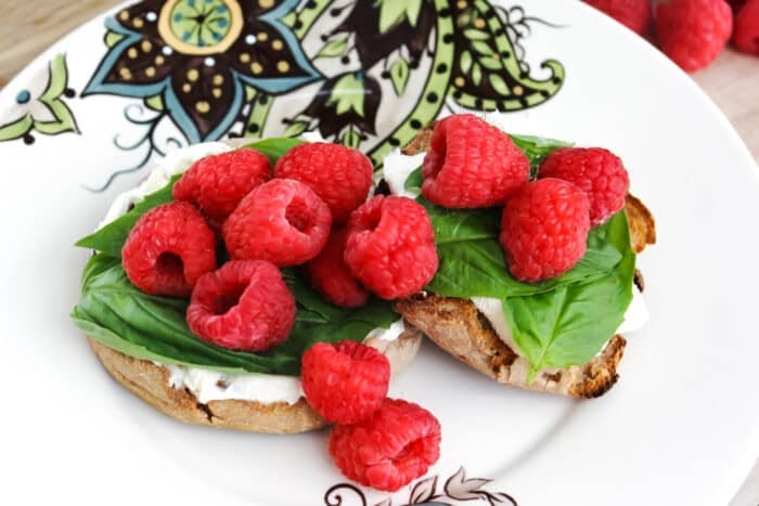 Raspberry as topping on an English muffin