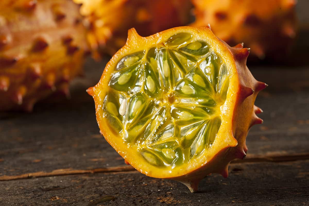 close up of kiwano melon cut in half