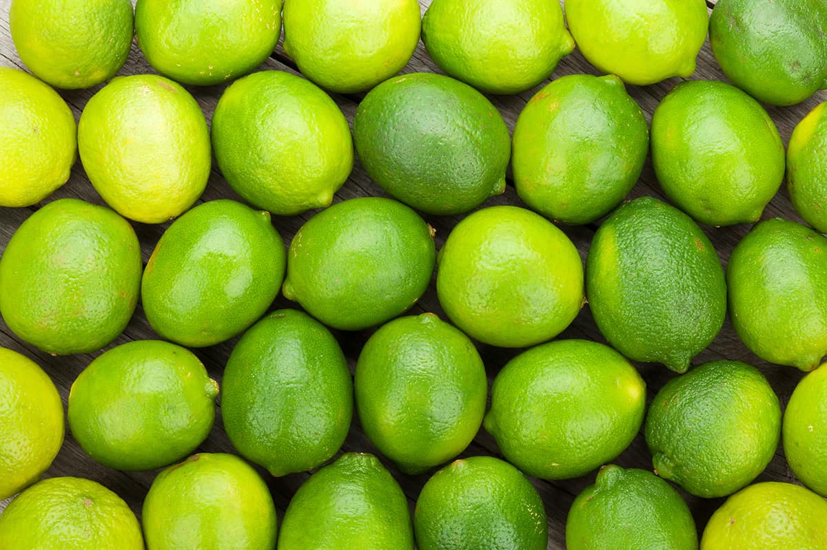 limes on table. 