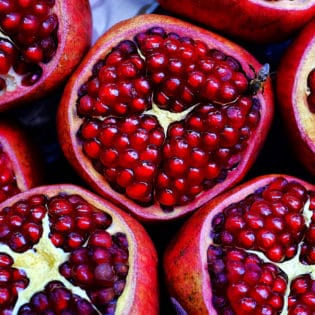 Close up shot of cut pomegranate fruits
