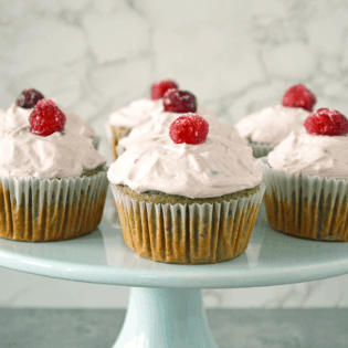 Cranberry cupcakes on cake stand.