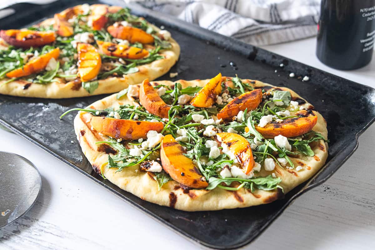 Grilled Peach and Goat Cheese Flatbread with arugula