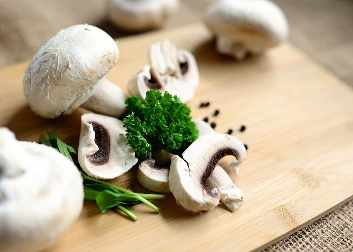 Turkey and Mushroom Tacos - Slicing Vegetables on Cutting Board