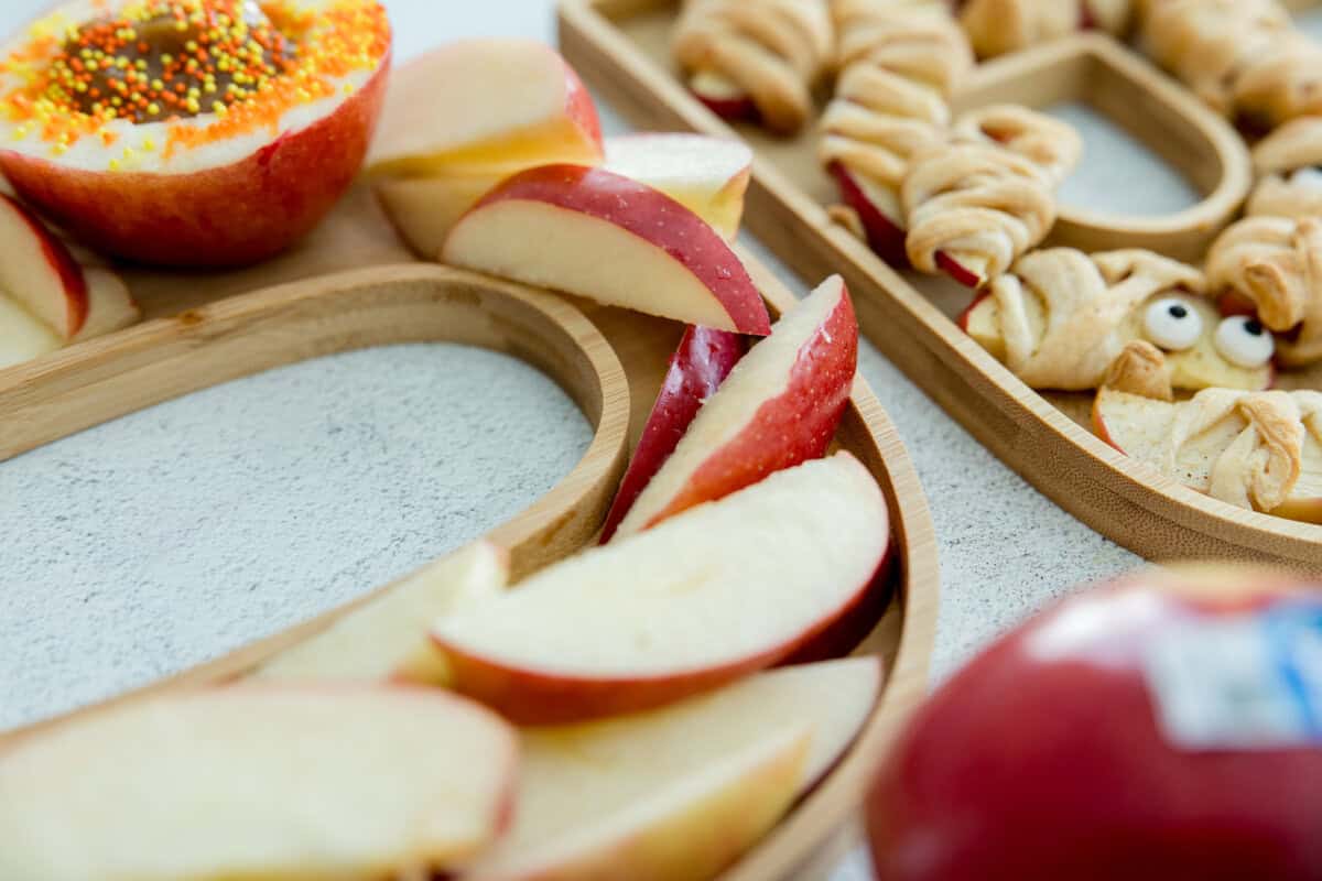 Apple slices in a Halloween board.