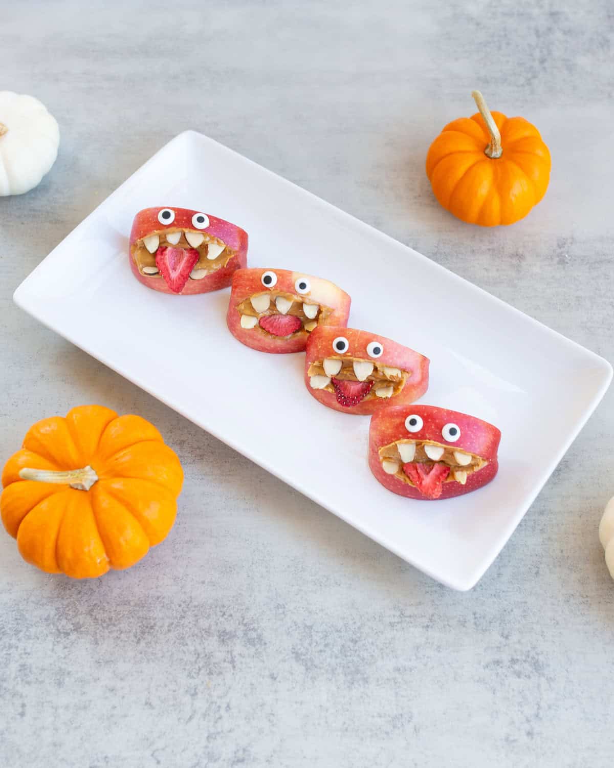 Apple Monsters Apple bites decorated as monsters