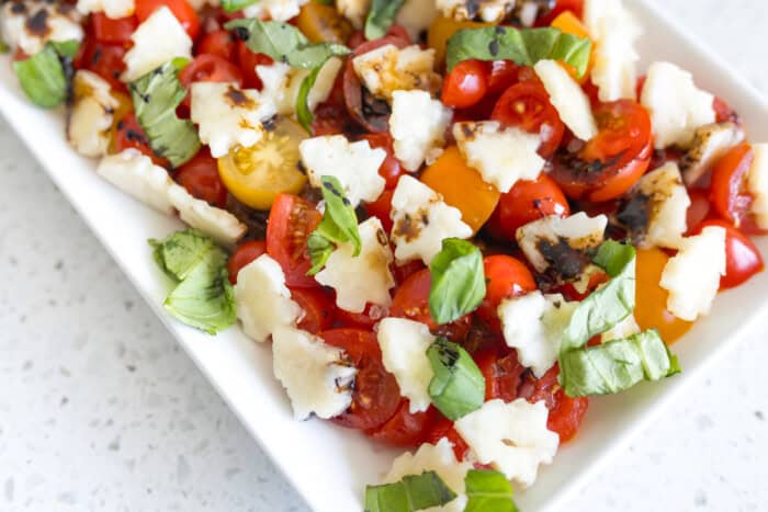 Close-up view of a mozzarella and tomato salad dish