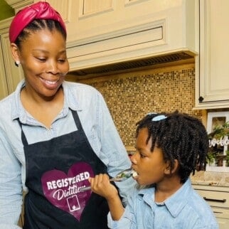 Registered Dietitian mom cooking with her daughter.